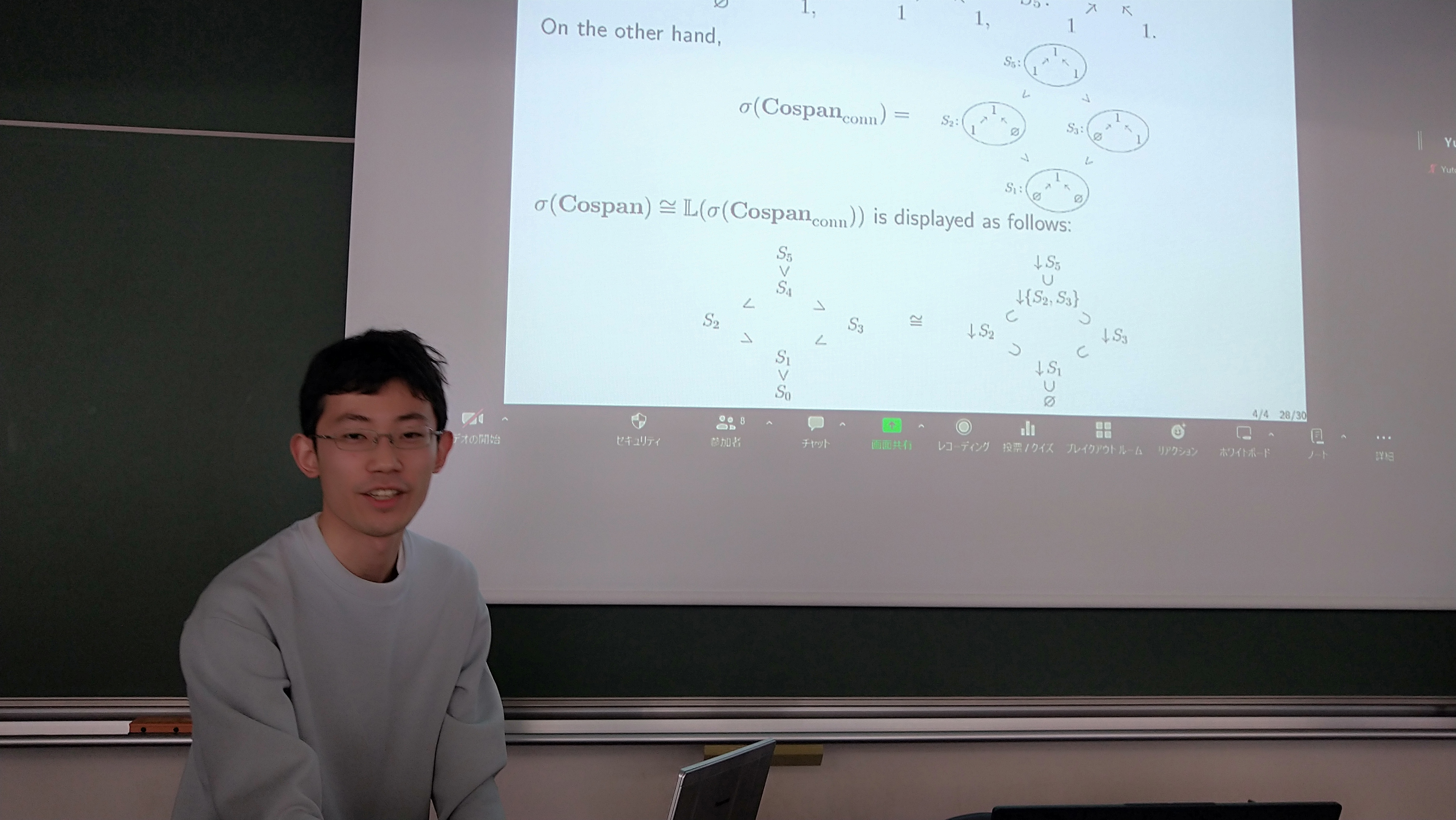 Yuto Kawase answering a question at the blackboard